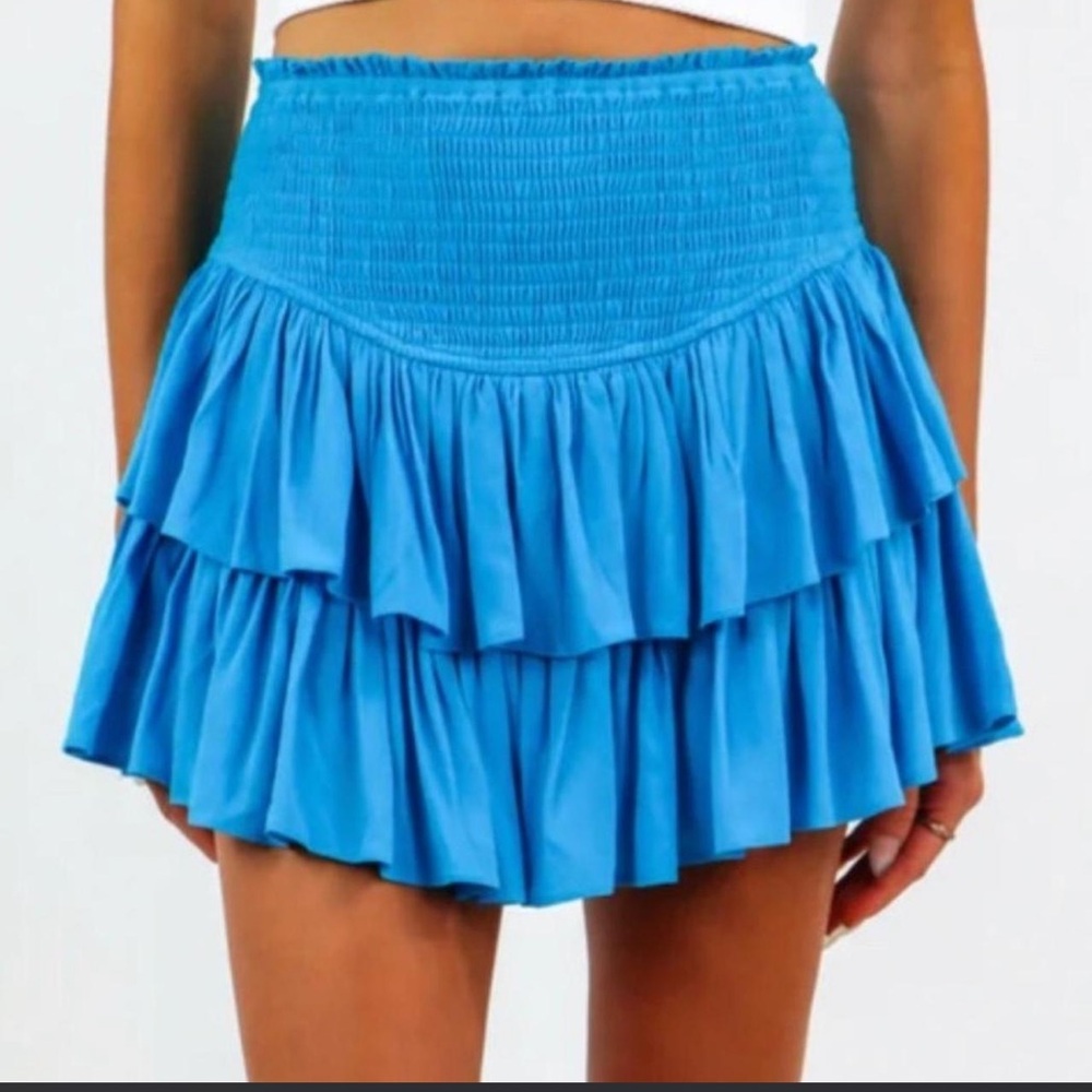 Blue ruffle mini skirt with built-in shorts
WORN ONCE
